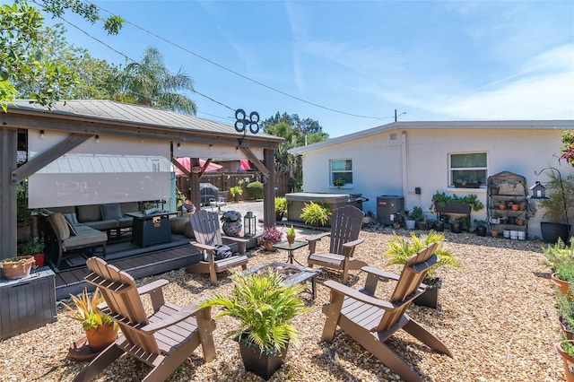 808 Camphor Way, Melbourne, FL 32901 - view of patio featuring a hot tub and a gazebo