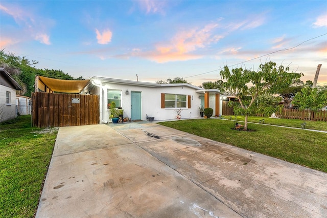 808 Camphor Way, Melbourne, FL 32901 - ranch-style house featuring concrete driveway and stucco siding