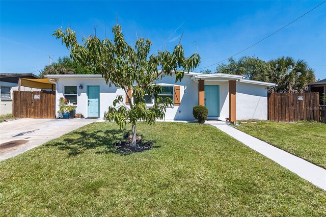 808 Camphor Way, Melbourne, FL 32901 - mid-century inspired home with stucco siding and concrete driveway