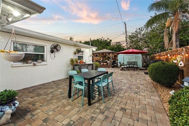808 Camphor Way, Melbourne, FL 32901 - view of patio featuring a gazebo and outdoor dining area