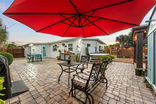 808 Camphor Way, Melbourne, FL 32901 - fenced backyard with outdoor dining space, a patio, and a hot tub