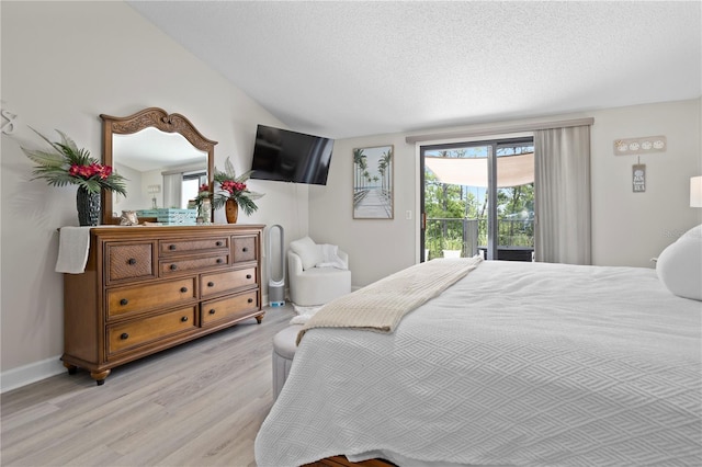 308 N Shadowbay Blvd Unit 214, Longwood, FL 32779 - bedroom featuring access to exterior and light wood-type flooring