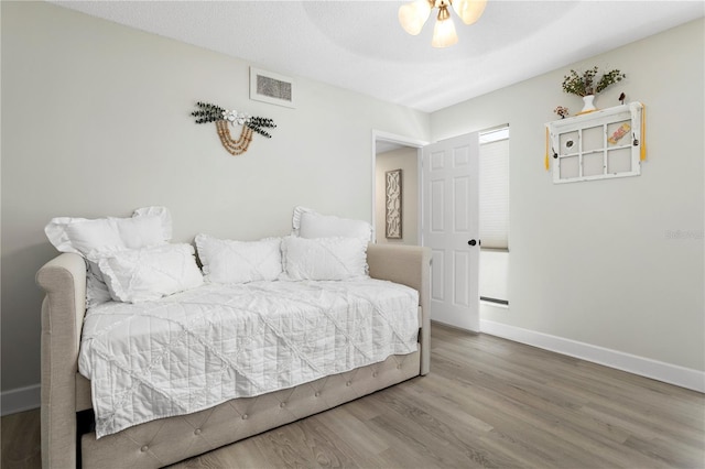 308 N Shadowbay Blvd Unit 214, Longwood, FL 32779 - bedroom featuring wood finished floors and baseboards