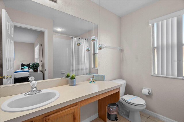 2717 Camaro Dr, Kissimmee, FL 34746 - full bathroom with tile patterned floors, vanity, and a shower with curtain