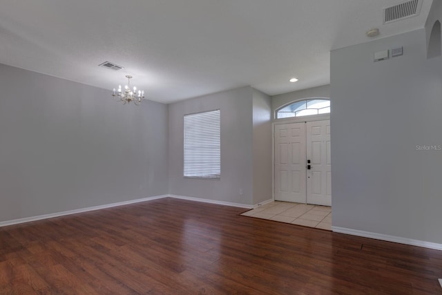2237 Wintermere Pointe Dr, Winter Garden, FL 34787 - foyer with wood finished floors, a chandelier, and recessed lighting