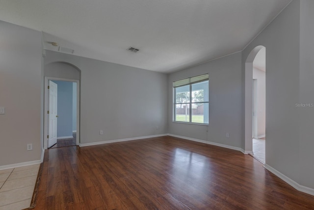2237 Wintermere Pointe Dr, Winter Garden, FL 34787 - unfurnished room with arched walkways and wood finished floors