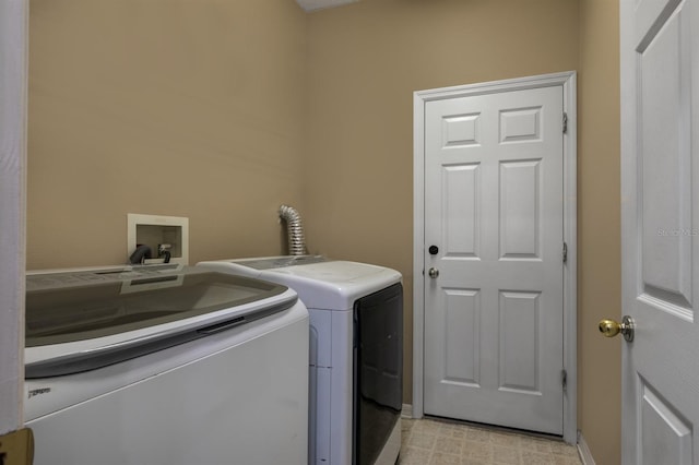 2237 Wintermere Pointe Dr, Winter Garden, FL 34787 - laundry room featuring washer and dryer and baseboards