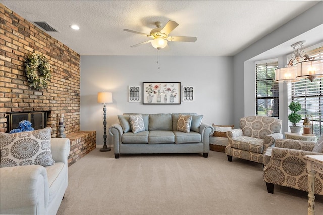 548 Timber Ridge Dr, Longwood, FL 32779 - living area featuring light colored carpet, a textured ceiling, ceiling fan, and a brick fireplace