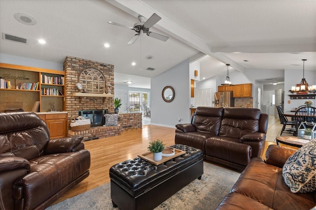 548 Timber Ridge Dr, Longwood, FL 32779 - living room with ceiling fan, light wood-style flooring, a brick fireplace, and recessed lighting