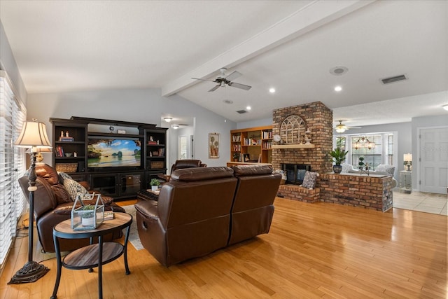 548 Timber Ridge Dr, Longwood, FL 32779 - living room featuring a ceiling fan, a fireplace, light wood-type flooring, and recessed lighting