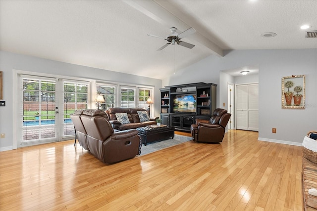 548 Timber Ridge Dr, Longwood, FL 32779 - living room with ceiling fan, light wood-style flooring, plenty of natural light, and a textured ceiling