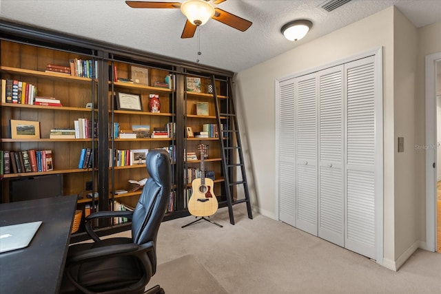 548 Timber Ridge Dr, Longwood, FL 32779 - carpeted office featuring a ceiling fan and a textured ceiling
