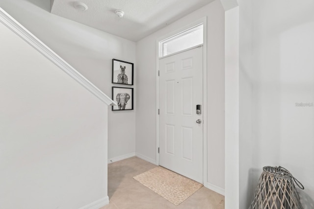 2355 White Lilly Dr, Kissimmee, FL 34747 - entrance foyer featuring baseboards