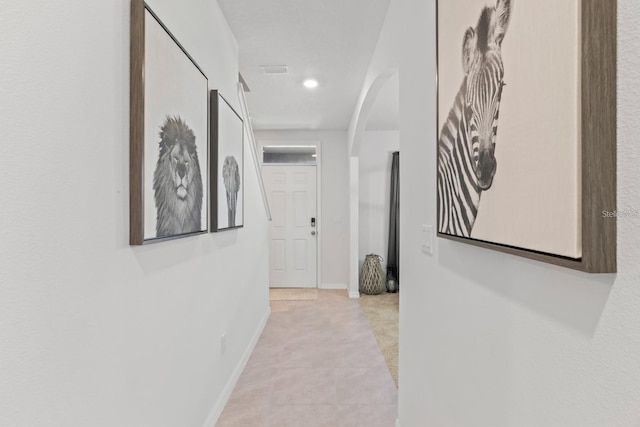 2355 White Lilly Dr, Kissimmee, FL 34747 - hallway featuring arched walkways and recessed lighting