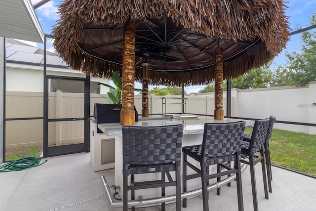 2355 White Lilly Dr, Kissimmee, FL 34747 - fenced backyard featuring a patio