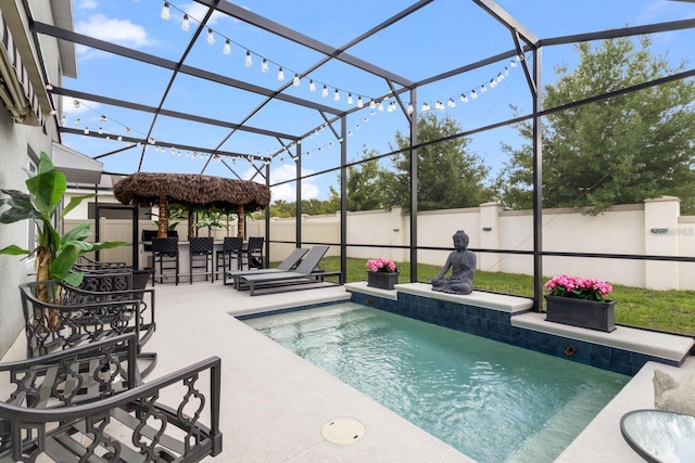2355 White Lilly Dr, Kissimmee, FL 34747 - view of pool featuring a fenced backyard, a patio area, and a lanai