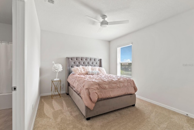 2355 White Lilly Dr, Kissimmee, FL 34747 - bedroom featuring carpet, a ceiling fan, and a textured ceiling