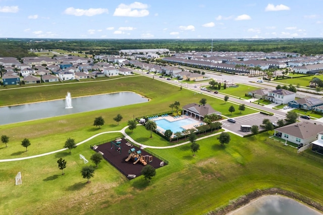 2355 White Lilly Dr, Kissimmee, FL 34747 - aerial perspective of suburban area with a large body of water