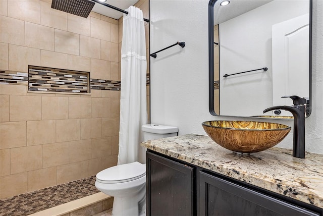 3706 Andover Cay Blvd, Orlando, FL 32825 - bathroom featuring vanity and a tile shower