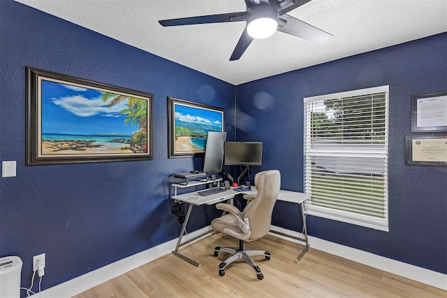 3706 Andover Cay Blvd, Orlando, FL 32825 - office space featuring wood finished floors, a ceiling fan, and a textured wall