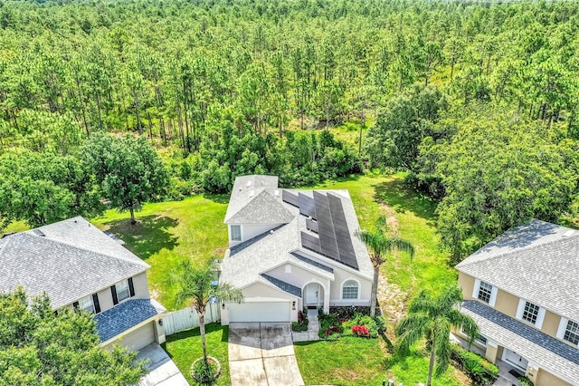 3706 Andover Cay Blvd, Orlando, FL 32825 - aerial view of property and surrounding area featuring a heavily wooded area