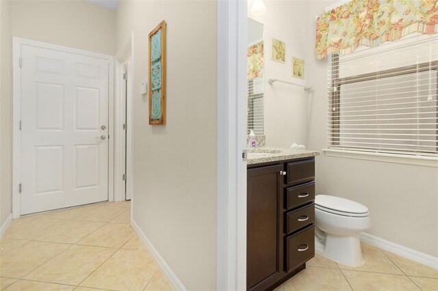 8912 Rhodes St, Kissimmee, FL 34747 - bathroom featuring tile patterned flooring and vanity
