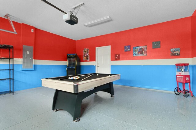 8912 Rhodes St, Kissimmee, FL 34747 - playroom with electric panel, billiards table, and speckled floor