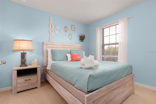 8912 Rhodes St, Kissimmee, FL 34747 - carpeted bedroom featuring baseboards