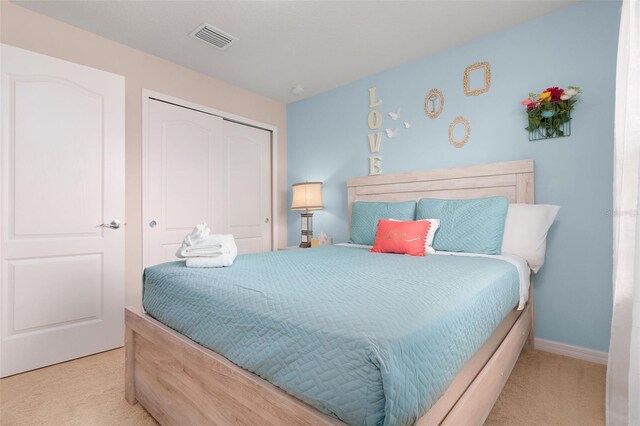 8912 Rhodes St, Kissimmee, FL 34747 - carpeted bedroom with a closet and baseboards