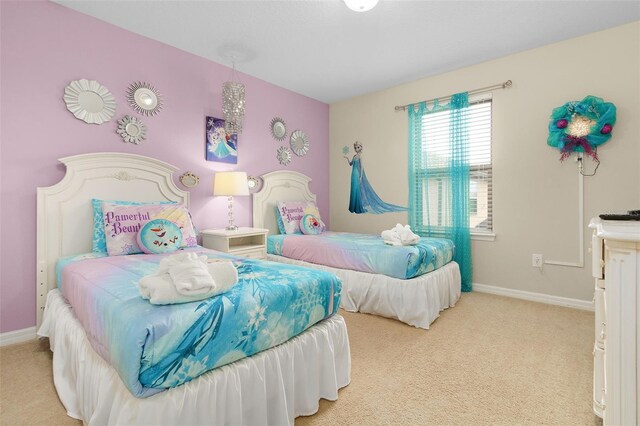 8912 Rhodes St, Kissimmee, FL 34747 - bedroom with carpet flooring and baseboards
