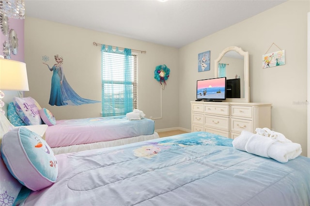 8912 Rhodes St, Kissimmee, FL 34747 - carpeted bedroom with baseboards