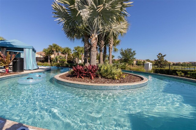 8912 Rhodes St, Kissimmee, FL 34747 - community pool with a gazebo
