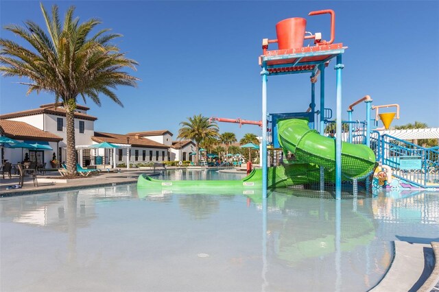 8912 Rhodes St, Kissimmee, FL 34747 - view of community featuring a pool