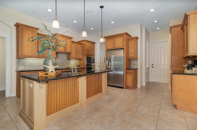 336 Highcroft Ct, Lake Mary, FL 32746 - kitchen featuring appliances with stainless steel finishes, decorative backsplash, brown cabinetry, light tile patterned floors, and recessed lighting
