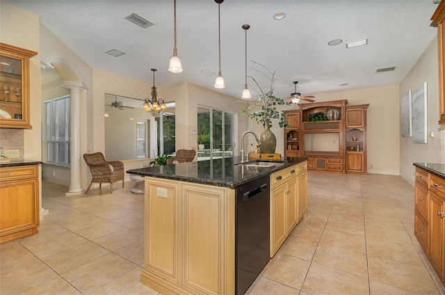 336 Highcroft Ct, Lake Mary, FL 32746 - kitchen featuring a ceiling fan, dishwashing machine, light tile patterned floors, a textured ceiling, and a kitchen island with sink