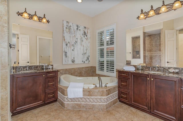 336 Highcroft Ct, Lake Mary, FL 32746 - bathroom featuring a bath, two vanities, and tile patterned floors