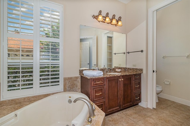 336 Highcroft Ct, Lake Mary, FL 32746 - bathroom with a garden tub, vanity, and tile patterned flooring