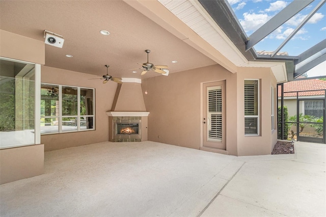 336 Highcroft Ct, Lake Mary, FL 32746 - view of patio featuring a fireplace, glass enclosure, and ceiling fan