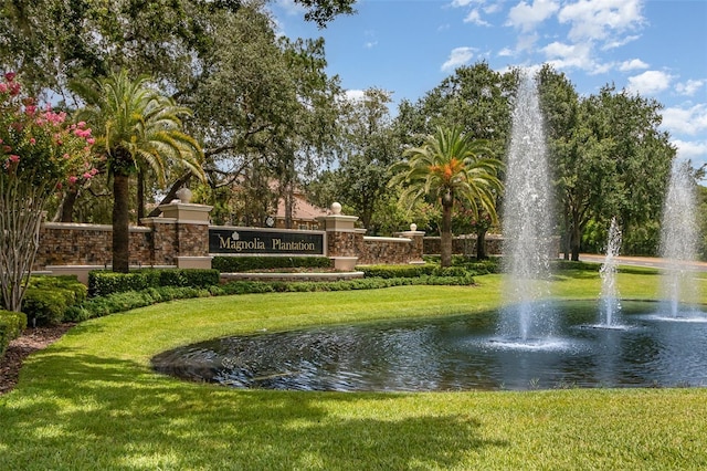 336 Highcroft Ct, Lake Mary, FL 32746 - community sign featuring a yard and a water view