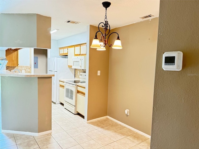 249 Afton Sq Unit 112, Altamonte Springs, FL 32714 - kitchen featuring white appliances, backsplash, a chandelier, light tile patterned floors, and light countertops