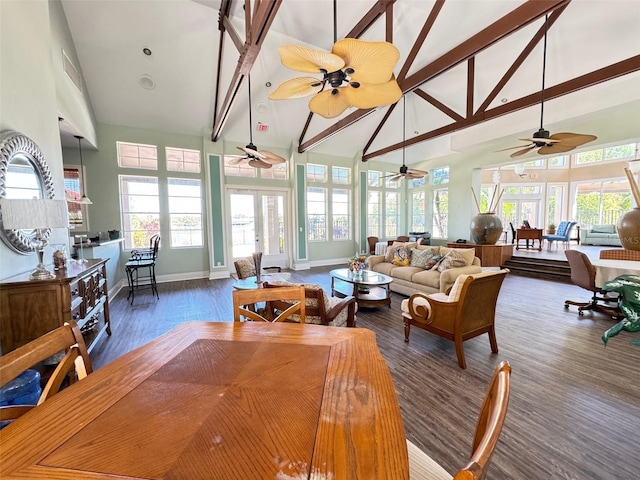 249 Afton Sq Unit 112, Altamonte Springs, FL 32714 - living room with high vaulted ceiling, a ceiling fan, wood finished floors, plenty of natural light, and beamed ceiling
