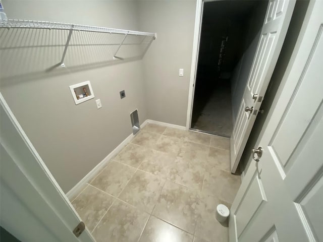 180 Ferguson St SE, Palm Bay, FL 32909 - laundry room with washer hookup, hookup for an electric dryer, and light tile patterned floors