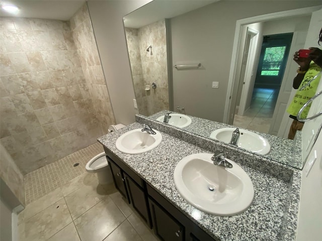 180 Ferguson St SE, Palm Bay, FL 32909 - full bathroom with tile patterned floors, tiled shower, and double vanity