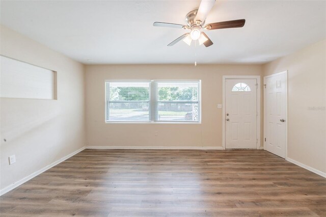 5908 Laconia Rd, Orlando, FL 32808 - entrance foyer featuring a ceiling fan and wood finished floors