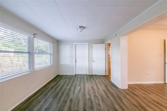 5908 Laconia Rd, Orlando, FL 32808 - spare room featuring wood finished floors and baseboards