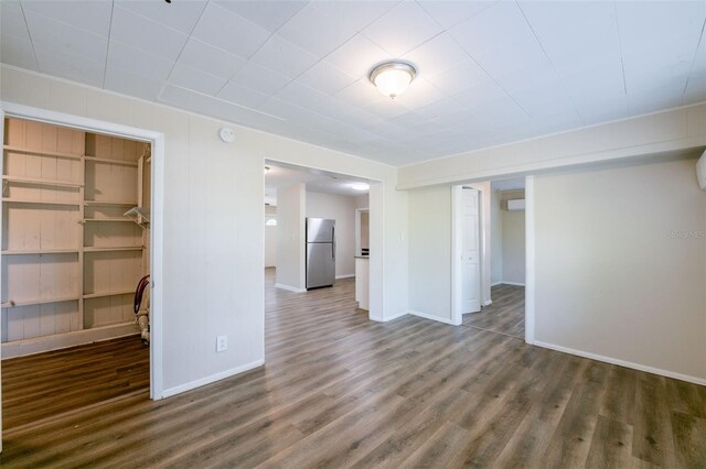 5908 Laconia Rd, Orlando, FL 32808 - unfurnished room with wood finished floors and baseboards