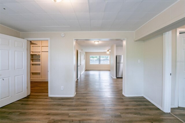 5908 Laconia Rd, Orlando, FL 32808 - corridor featuring dark wood-style flooring and baseboards