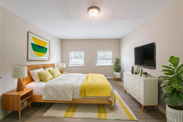 5908 Laconia Rd, Orlando, FL 32808 - bedroom with wood finished floors and baseboards