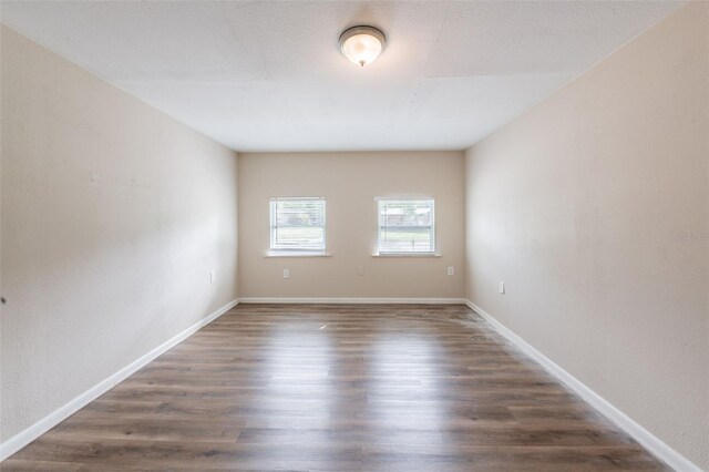 5908 Laconia Rd, Orlando, FL 32808 - spare room with wood finished floors