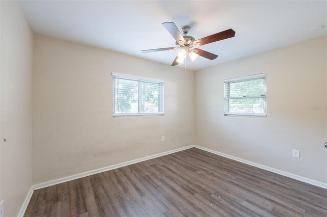 5908 Laconia Rd, Orlando, FL 32808 - unfurnished room with plenty of natural light, wood finished floors, and ceiling fan